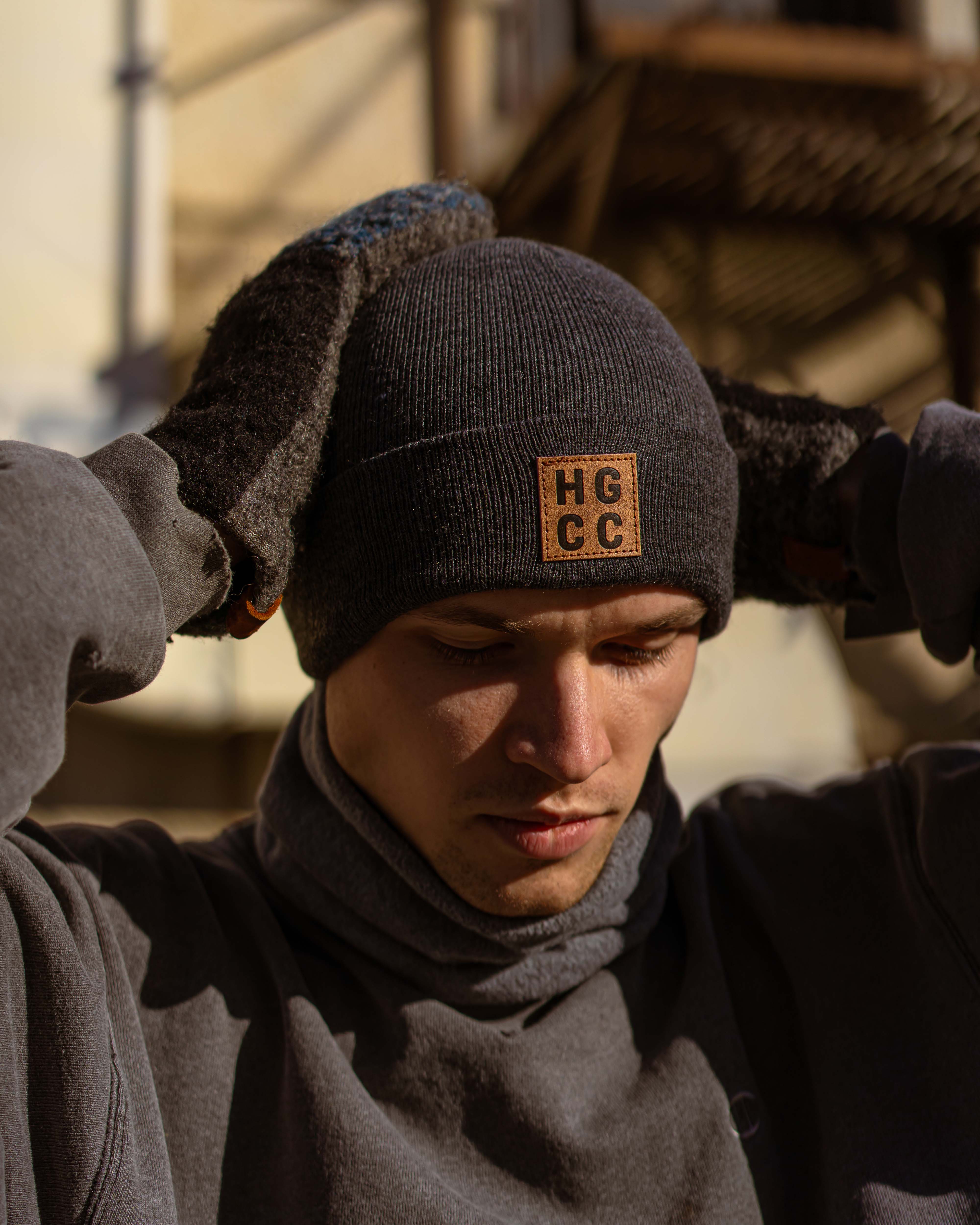 Happy goat toque featured on a model's head